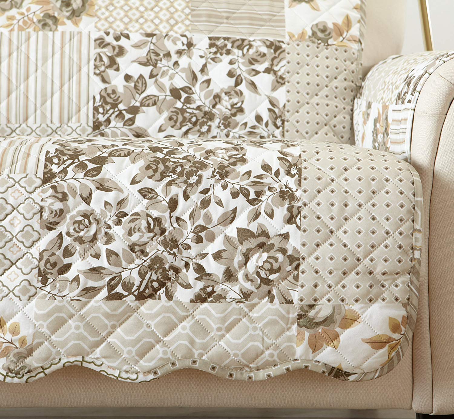 Great Bay Home close-up stitch detail on the taupe sofa cover for pet-friendly protection.