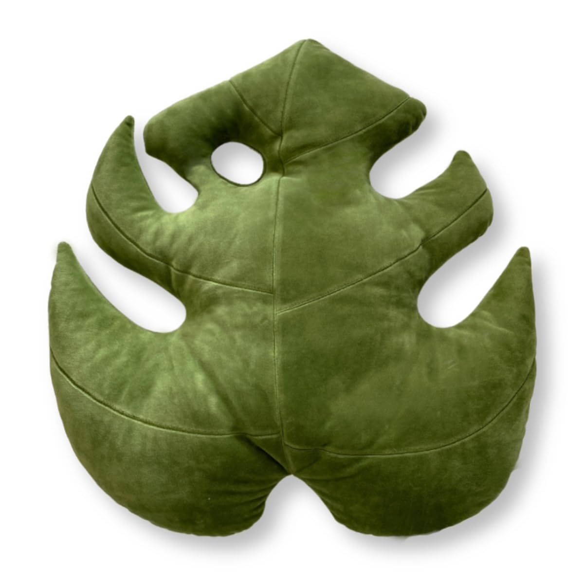 Green Philosophy Co. Monstera Leaf Pillow closeup highlights ultra-soft plush for cozy seating.