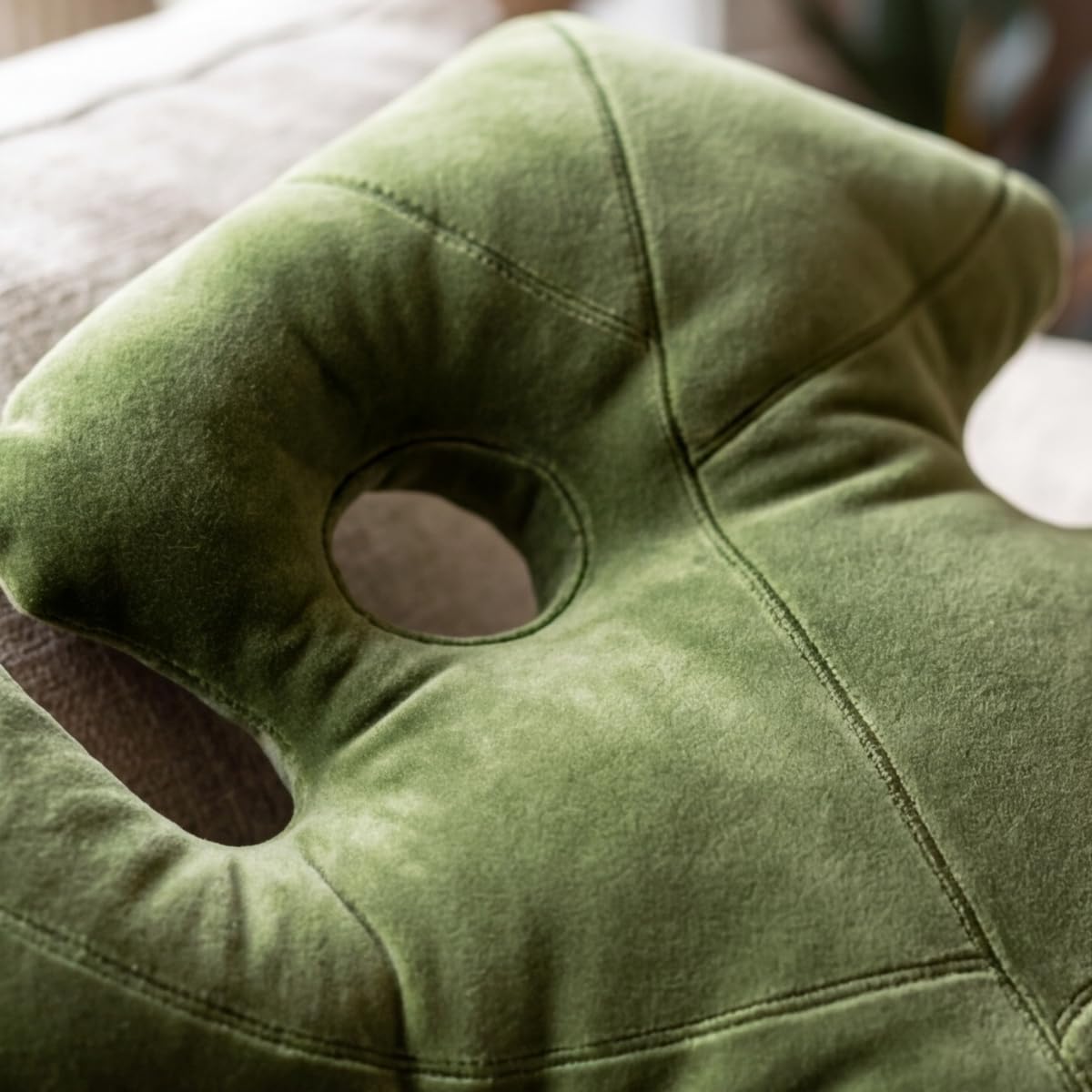 Green Philosophy Co. Monstera Leaf Pillow indoor comfort for couches and reading nooks.