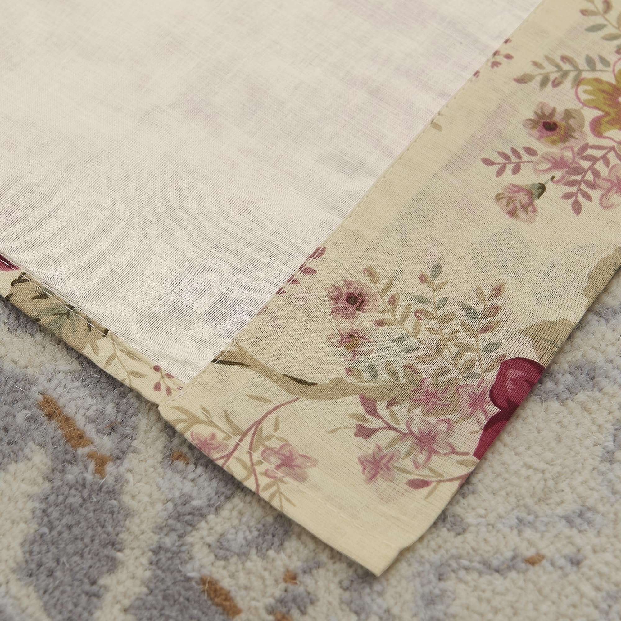 Panel set with tie backs adds charm to window treatment
