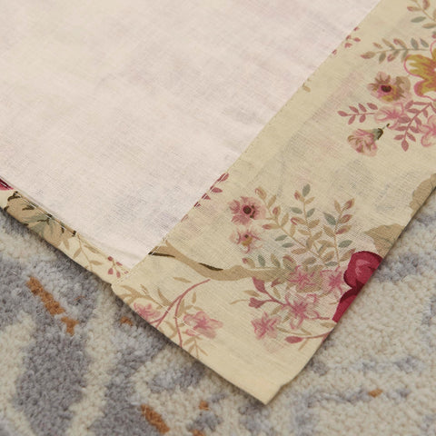 Panel set with tie backs adds charm to window treatment