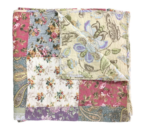 Greenland Home Blooming Prairie patchwork squares with bound edges for durable warmth.
