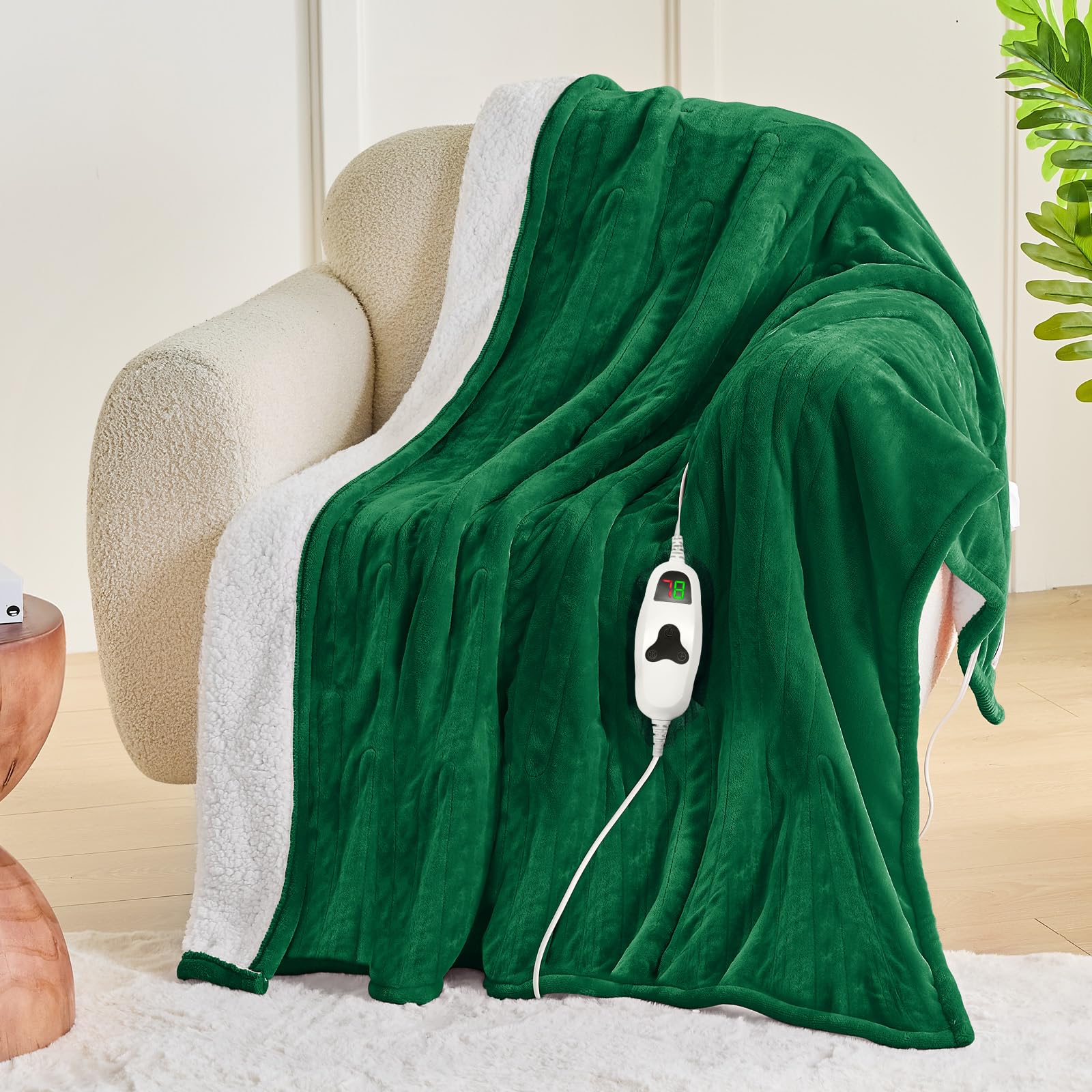 Greenoak emerald throw under a Christmas tree, gift-ready.