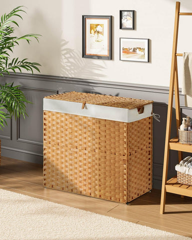 Greenstell hamper side handles for easy transport between rooms.