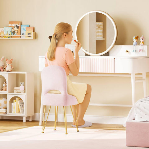 Greenstell vanity stool with storage keeps brushes and skincare within reach.