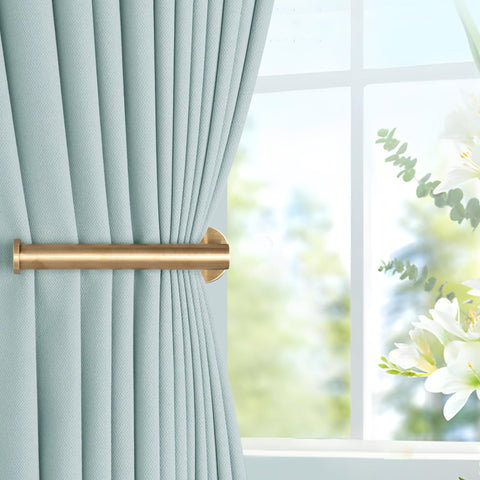 Groleca modern curtain holders gold complement contemporary decor.
