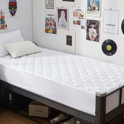 GRT Twin XL waterproof mattress protector with TPU backing protects against spills