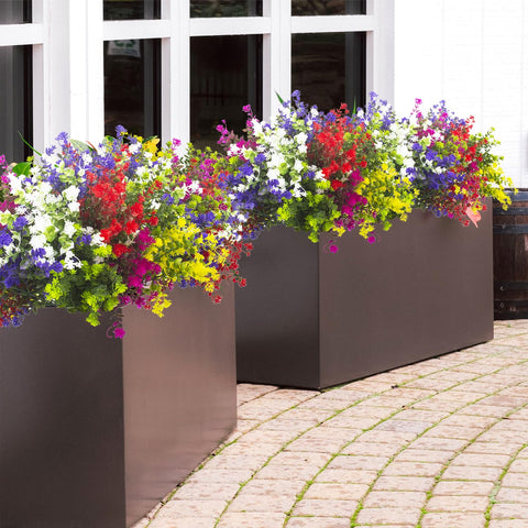 Grunyia artificial flowers resist fading in sunlit spaces for outdoor displays.