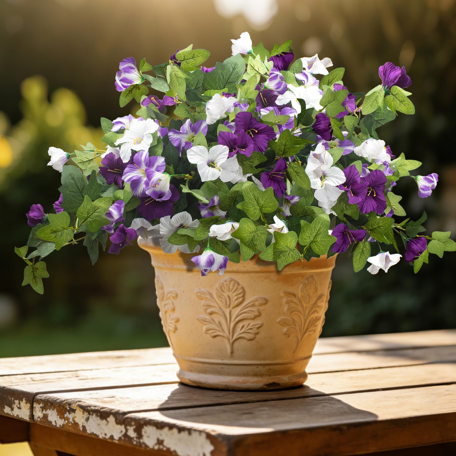 Grunyia artificial petunia blooms arranged in planters for porch and balcony.