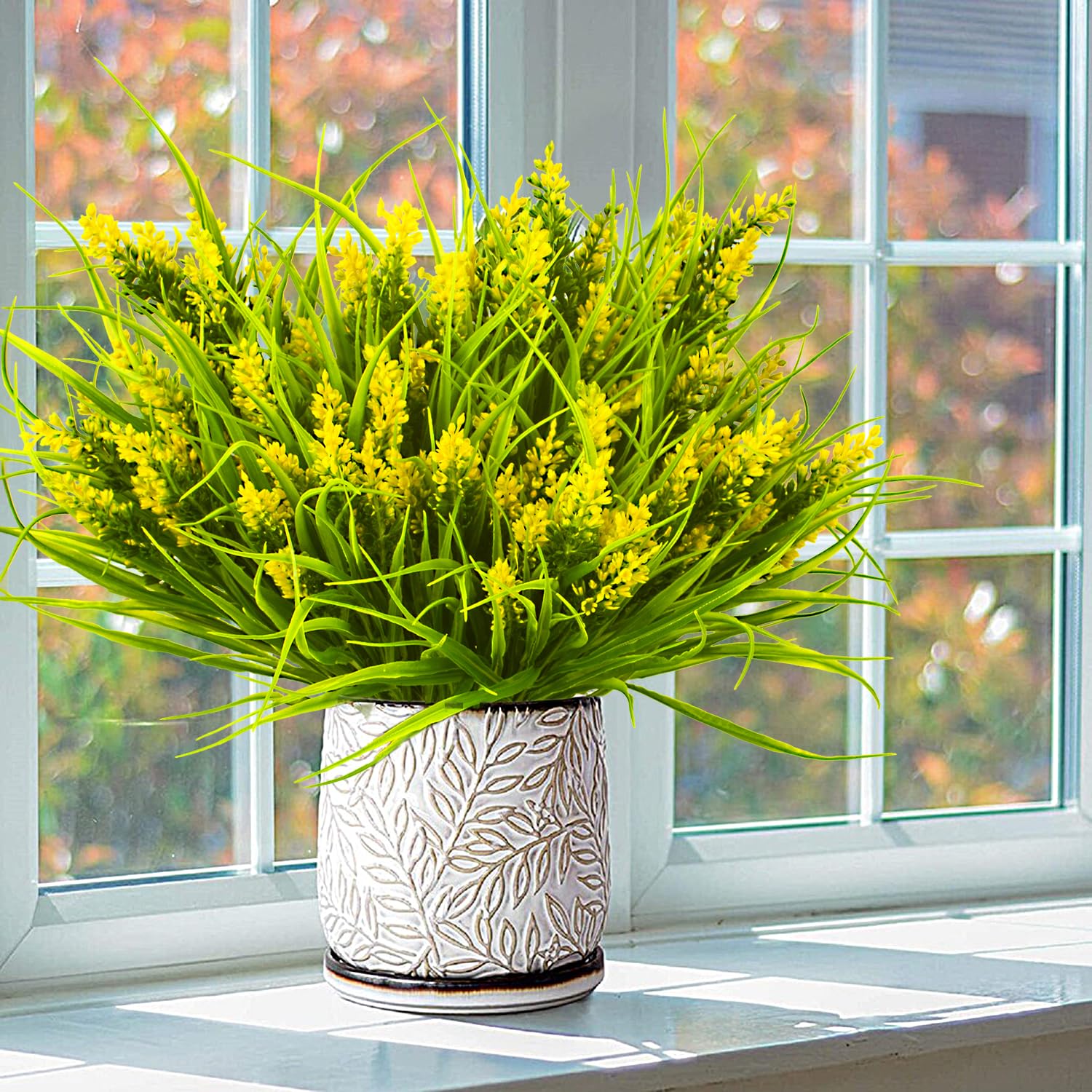 Grunyia yellow-flower monkey grass brightens mantels and tables