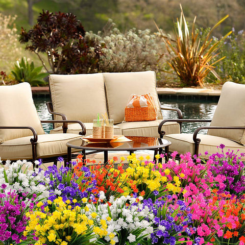 Grunyia hanging planter display shows faux blooms in various setups.