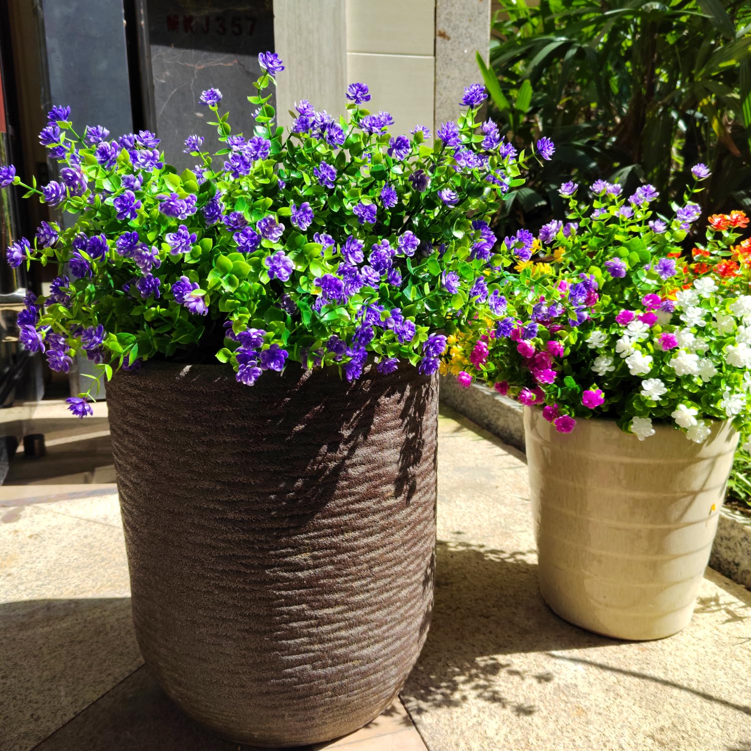 Grunyia realistic plastic plants for evergreen outdoor display.