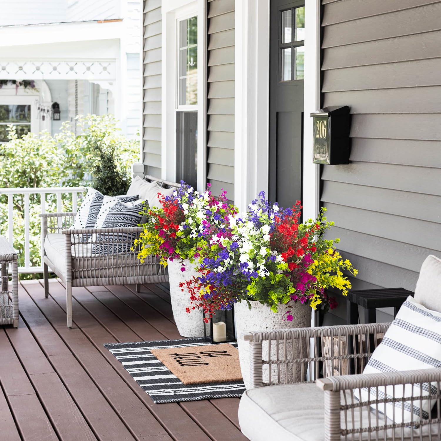 Grunyia window box fake flowers add charm with year round color.