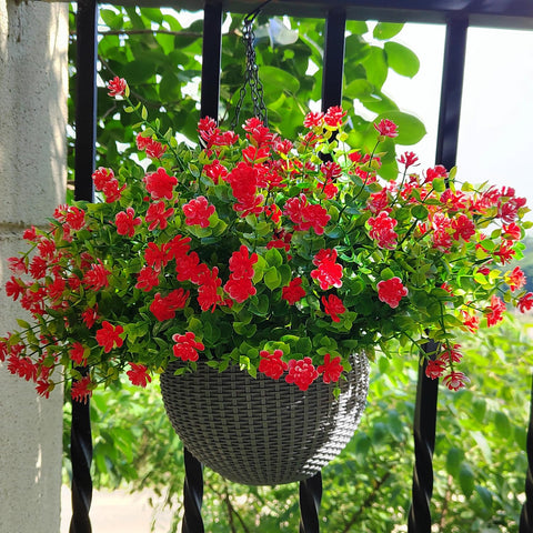Grunyia red artificial flowers arranged in a window box for curb appeal