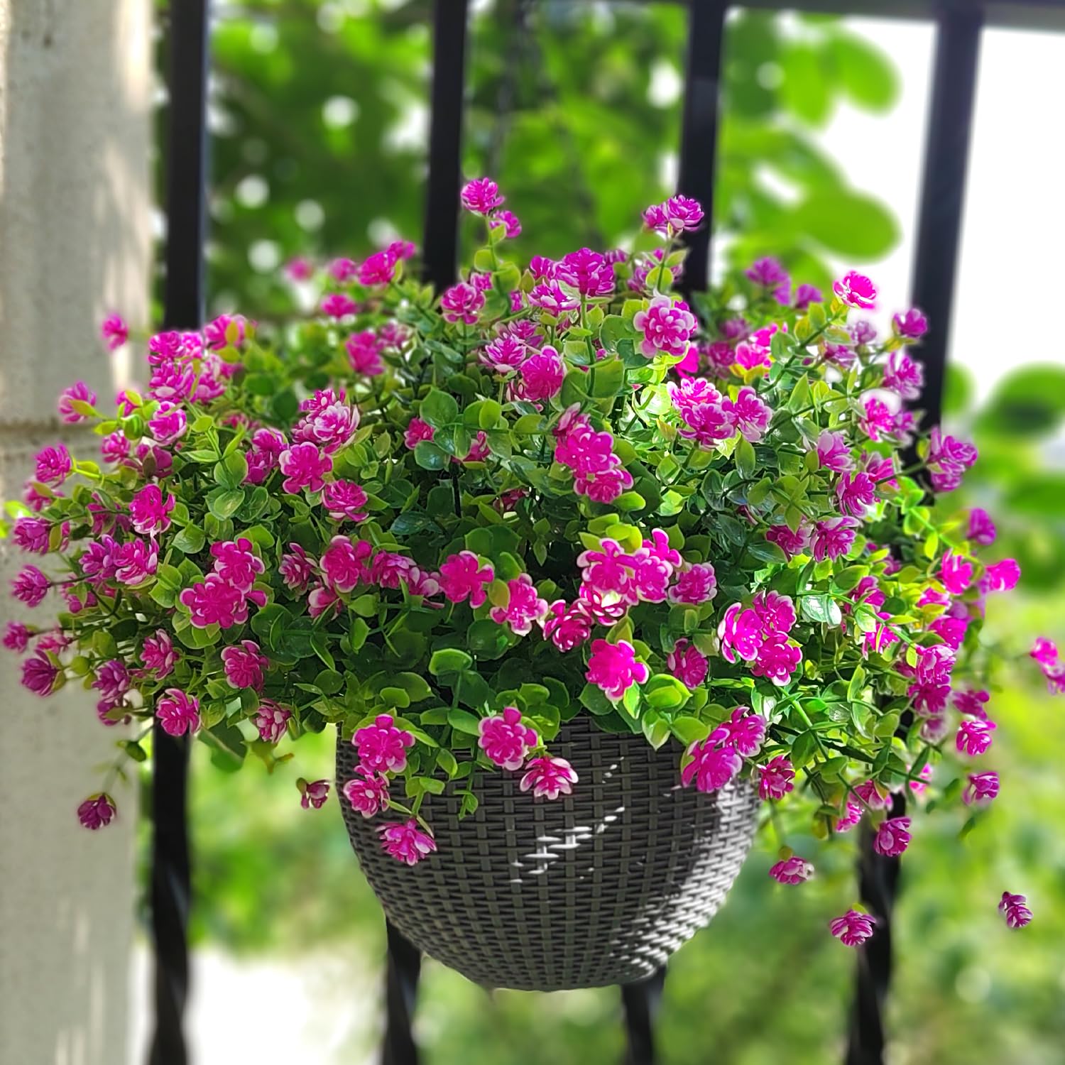 Grunyia pink faux blooms for window boxes brighten porches.