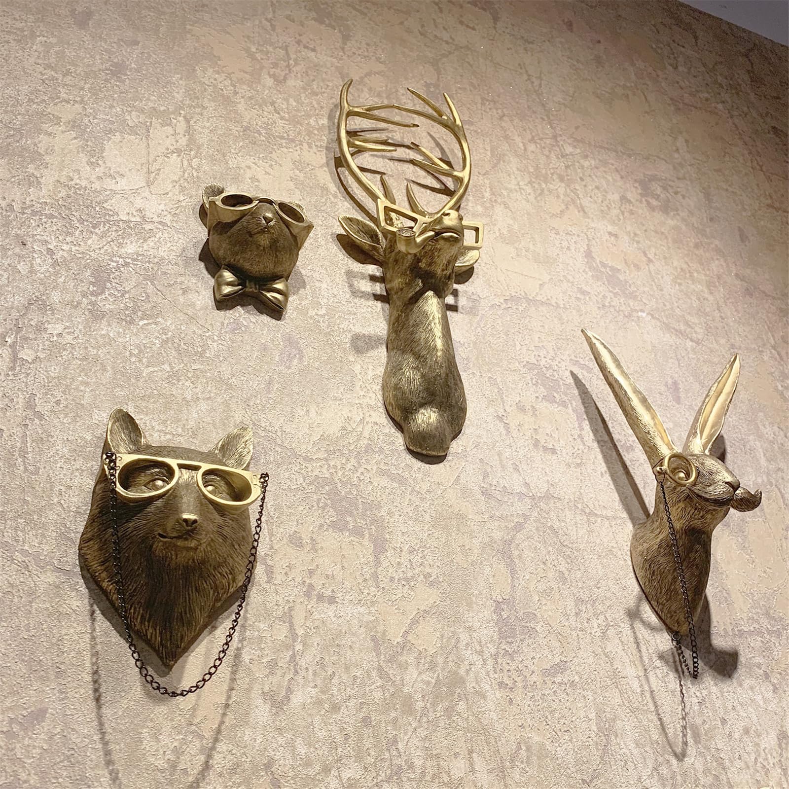 GUASDIE dining room sculpture with gold finish elevates dining area.
