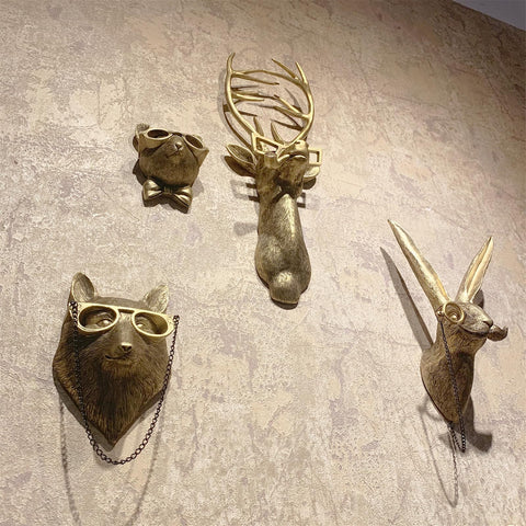 GUASDIE dining room sculpture with gold finish elevates dining area.