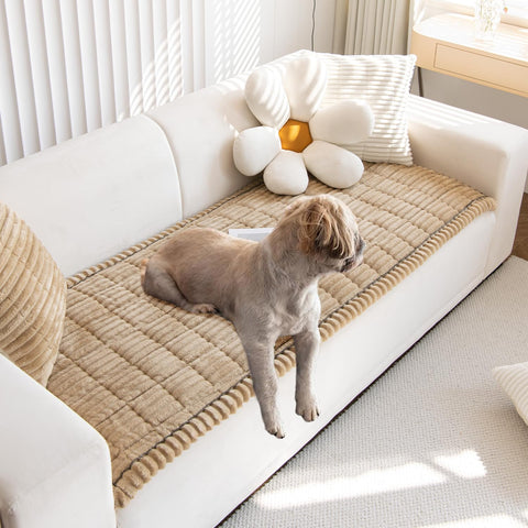 Gumfolk pet couch cover in brown protects sofa from scratches and spills.