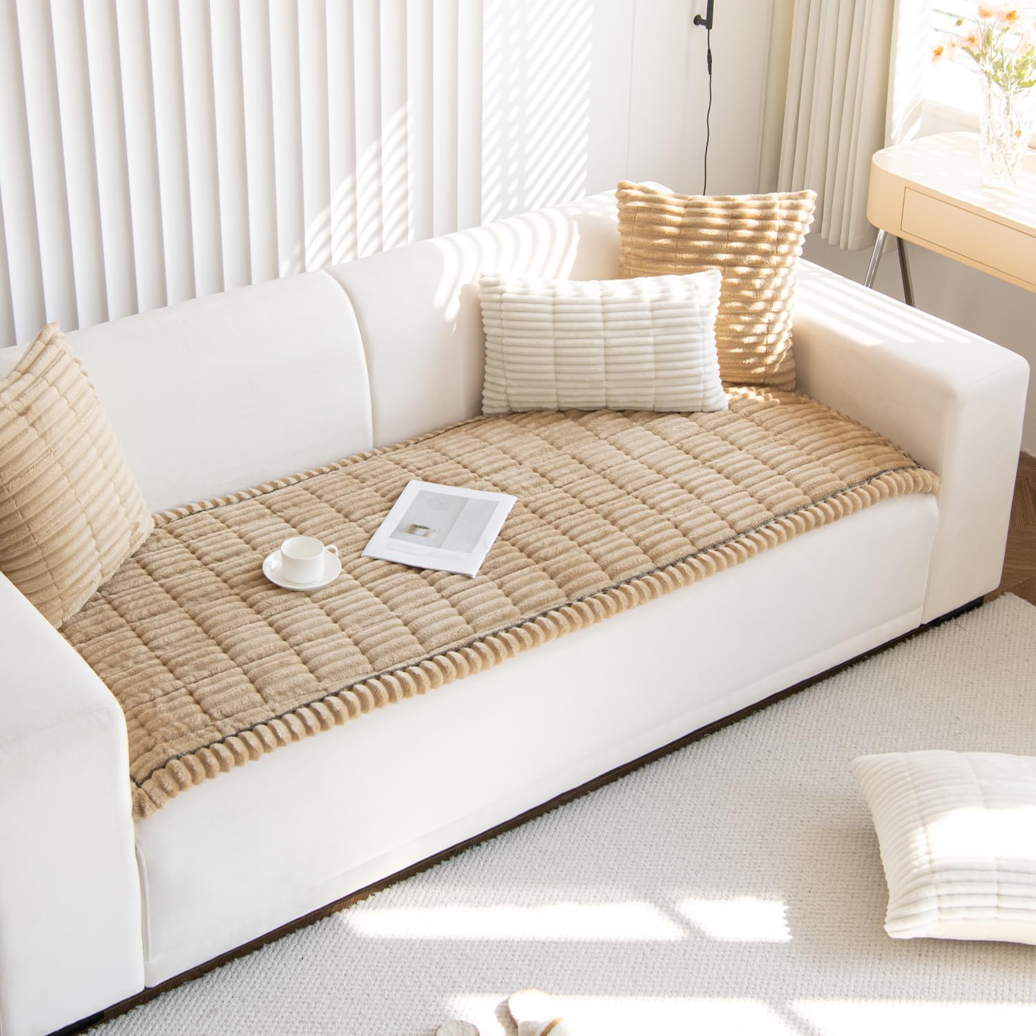 Gumfolk couch cover in wash cycle, demonstrating machine washable feature