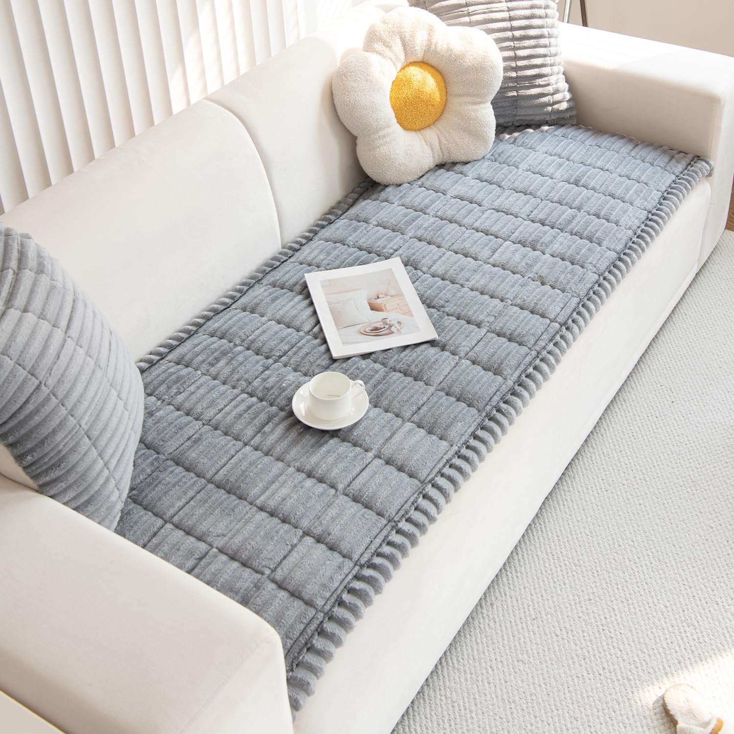 Gumfolk sofa protector demonstrated on different furniture for a versatile fit