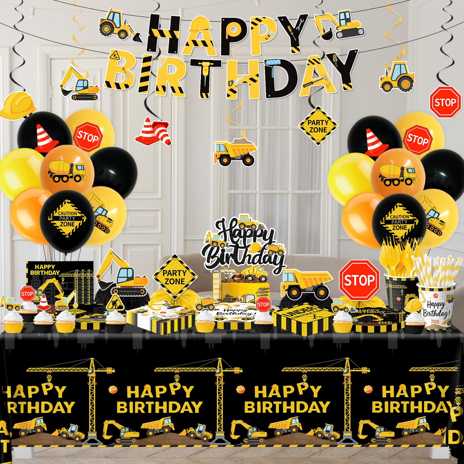 Guzbewu balloons and banner creating a bright truck theme backdrop