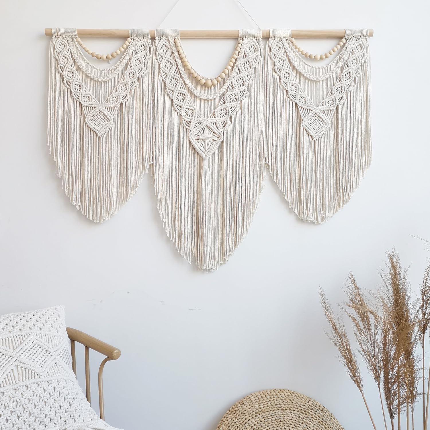 Guzhiou wall art complements sofas and mantels with chic boho appeal.