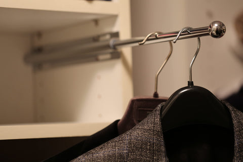 H. Bowes valet rod extended to 8-3/4 inches for versatile garment handling.