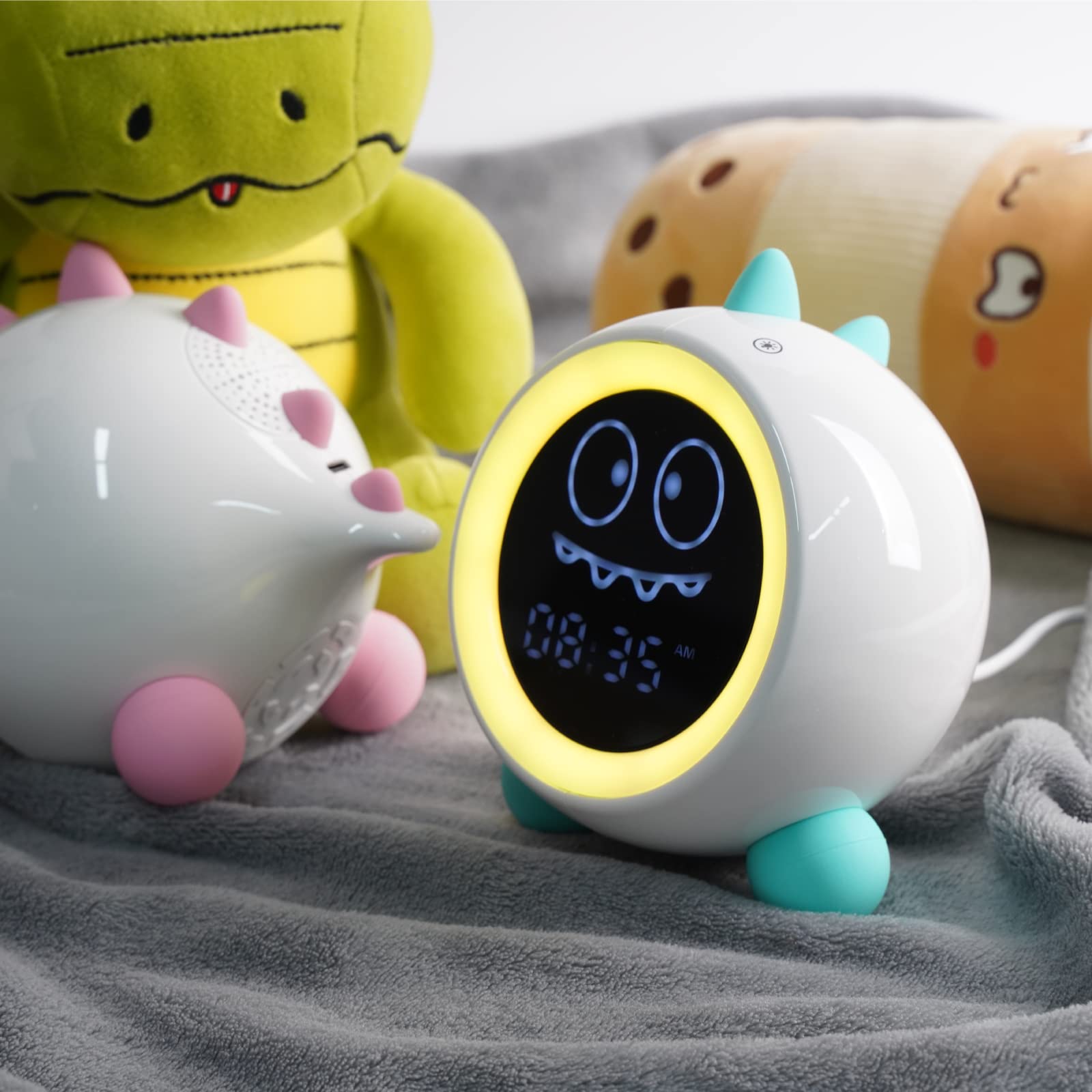 H-chin dino alarm clock green plug-in design for reliable power
