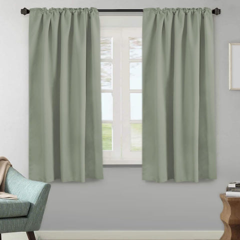 H.VERSAILTEX blackout curtains in living room setting for privacy and glare reduction.