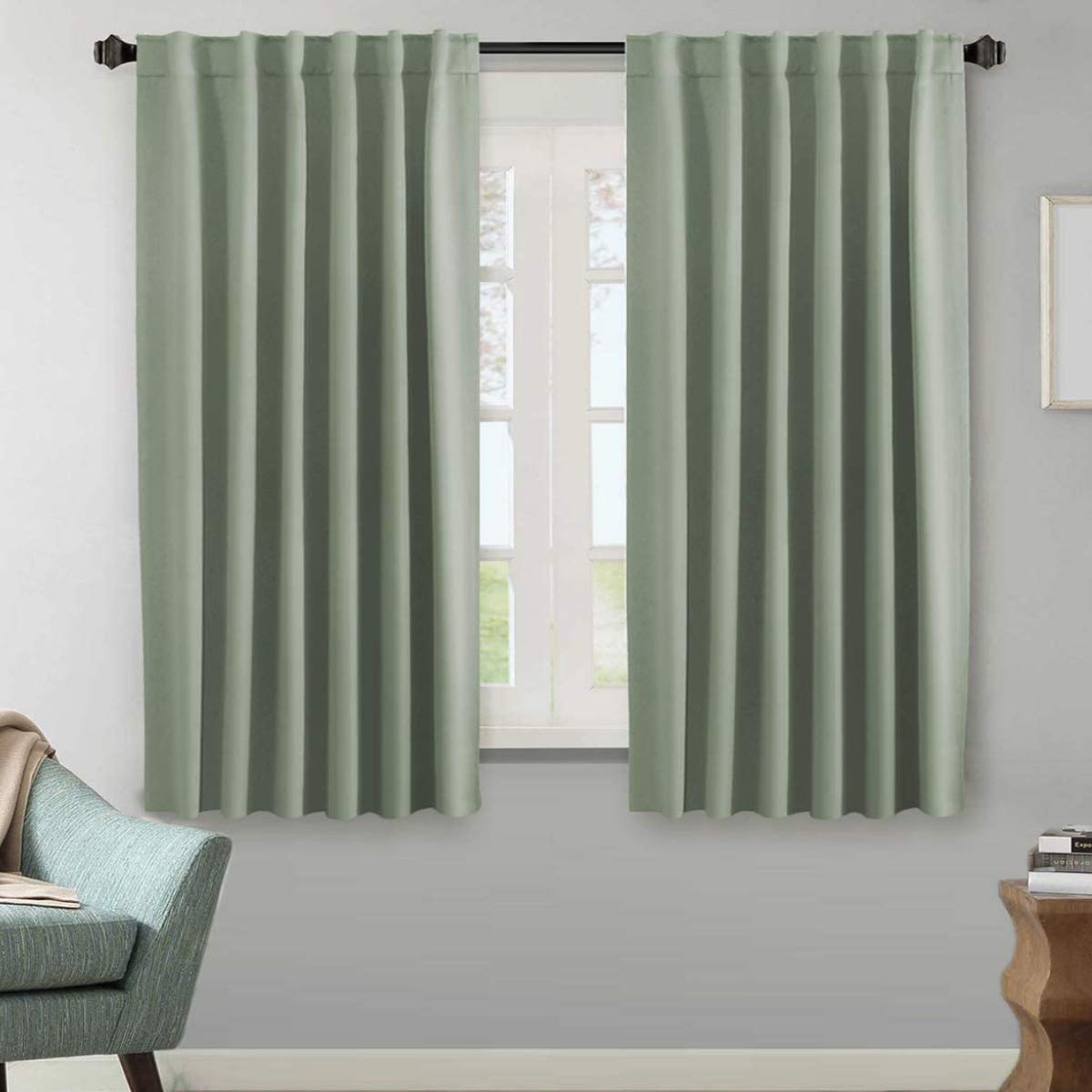 H.VERSAILTEX blackout curtain panel in light sage with soft microfiber and light control.