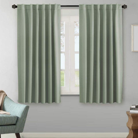 H.VERSAILTEX blackout curtain panel in light sage with soft microfiber and light control.