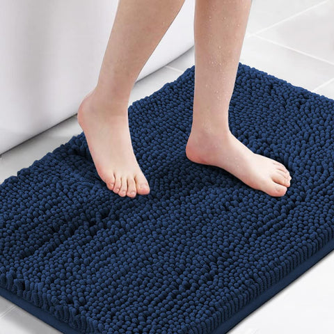 H.VERSAILTEX navy bath mat with non-slip bottom for safe footing.