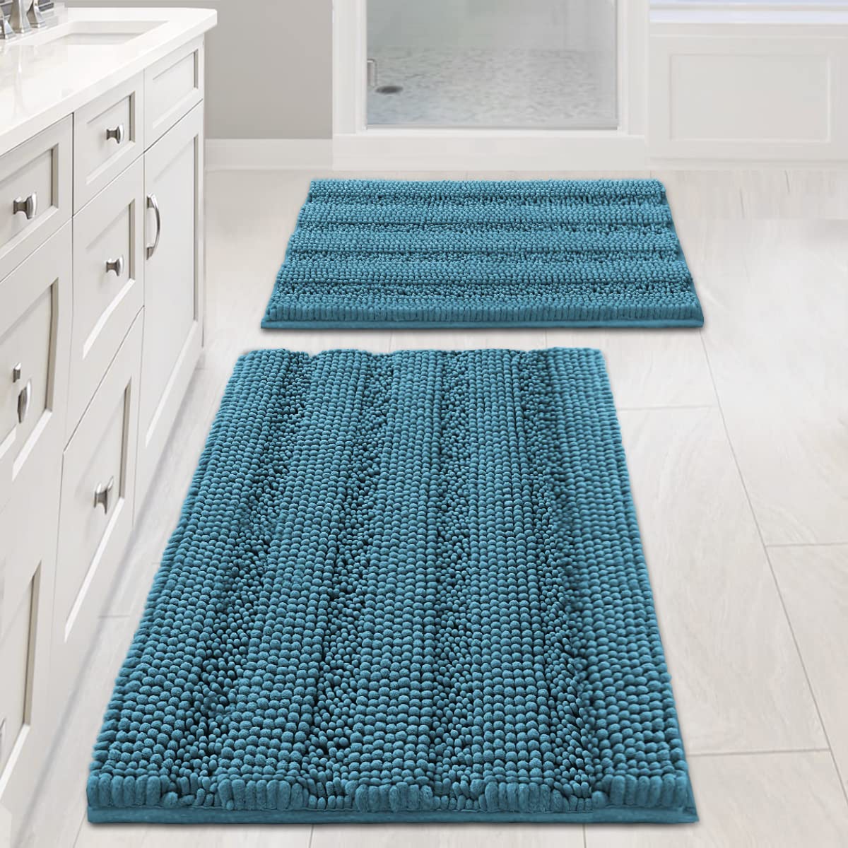 H.VERSAILTEX turquoise bath rug 2-piece set adds soft luxury to your bathroom.