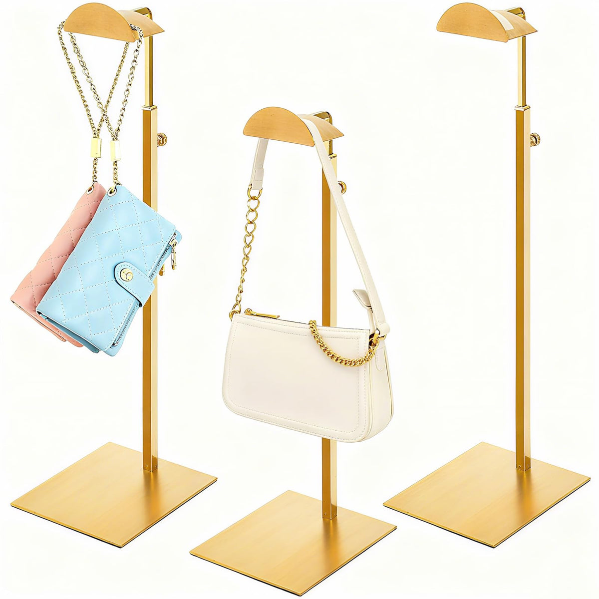 Hacaroa gold 3-pack purse display stands on shelf.