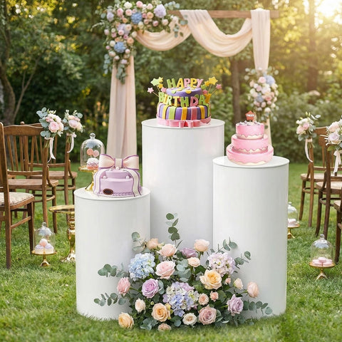 HAISIWLKJ cylinder-stand-dessert-table-setup elevates dessert trays with a clean white backdrop.
