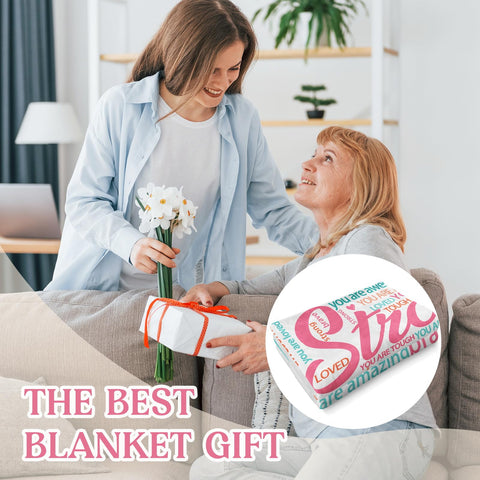 Hakumata hug blanket folded display highlights easy care and cozy appeal.