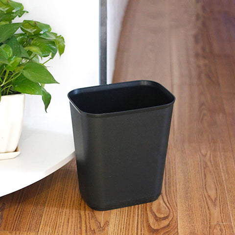 Halyuhn plastic trash bin small-space solution near desks.