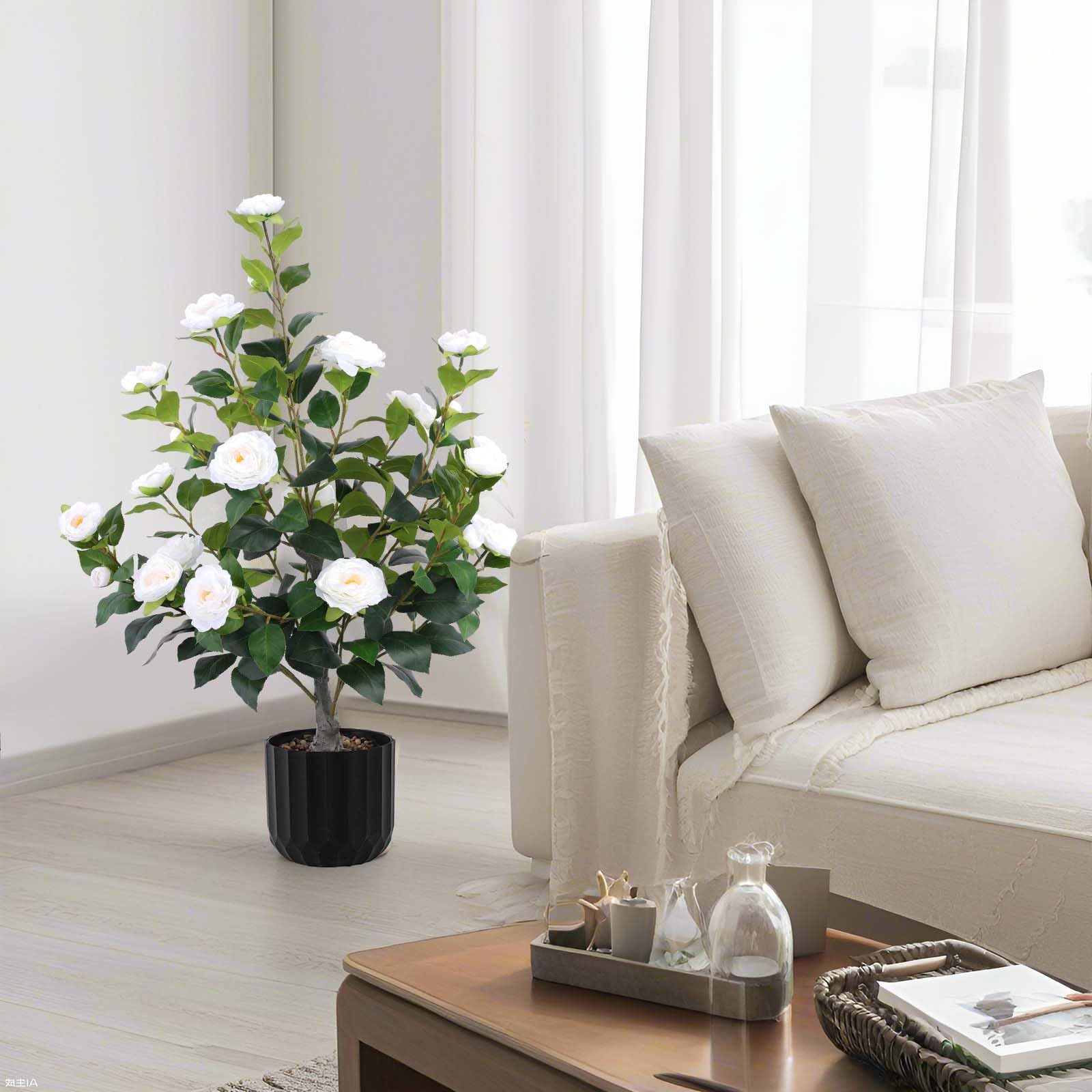Hananona camellia tree wedding backdrop setup for romantic celebrations.