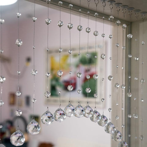 Hanbinsen crystal bead string curtain used as room divider in a cozy space