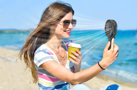 HandFan handheld operation with ergonomic grip for on-the-go cooling