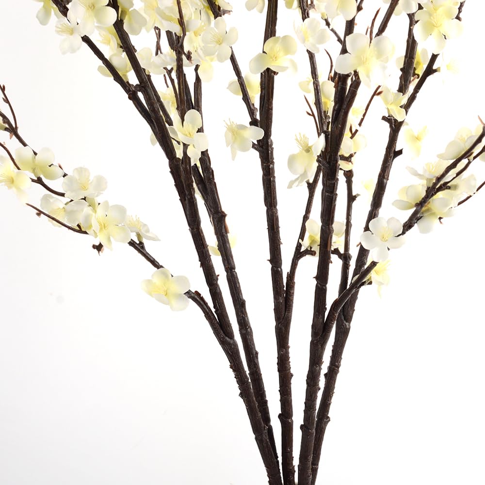 HANDIC cherry blossom branches enhance home decor with natural charm.