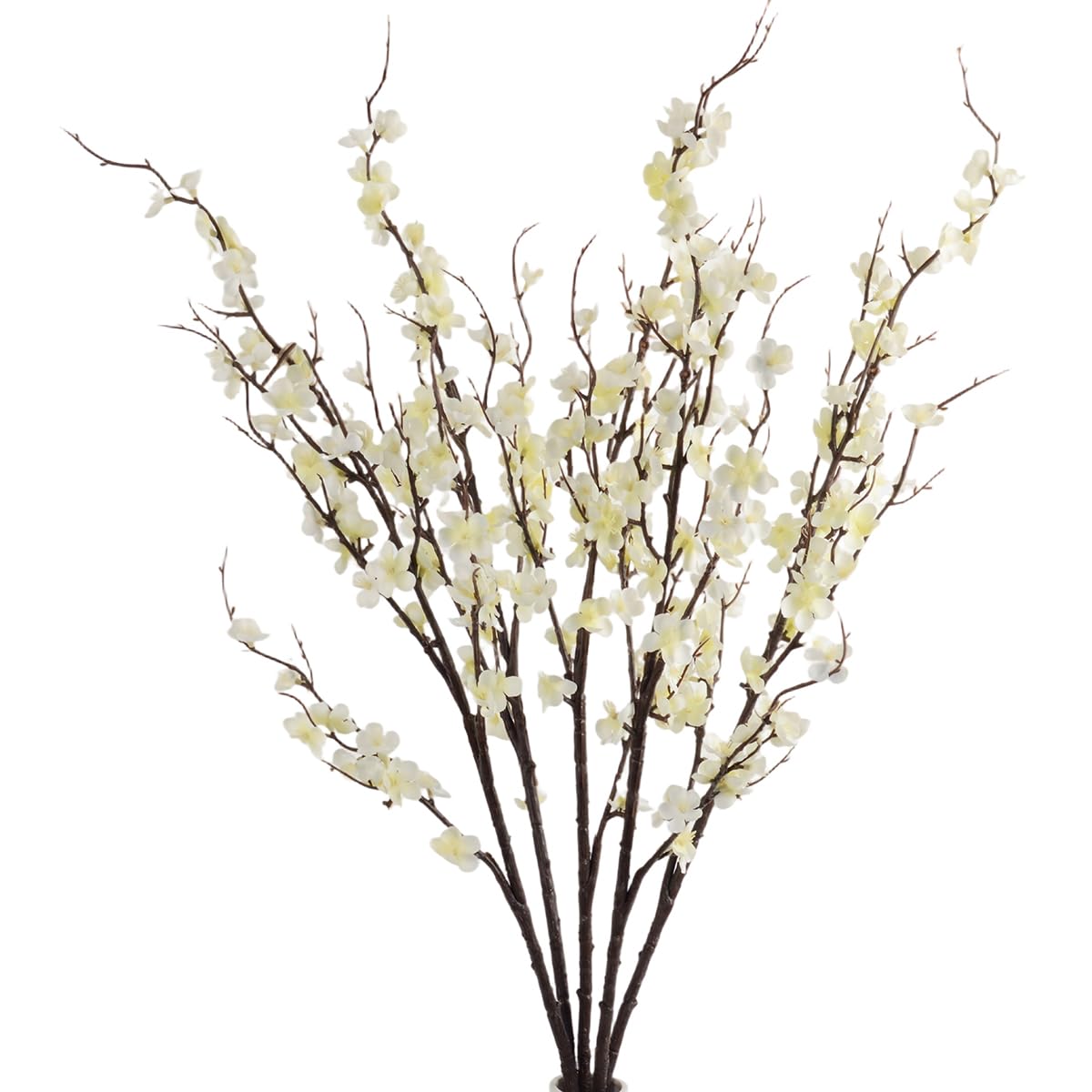 HANDIC cherry blossom branches in a vase create a romantic centerpiece.