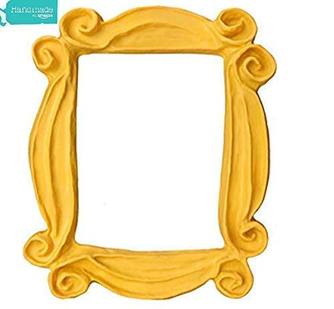Office wall display featuring HANDMADE WITH LOVE BY FATIMA Monica frame.