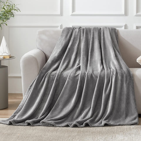 Hansleep blanket decor on bed adds cozy texture to the room.