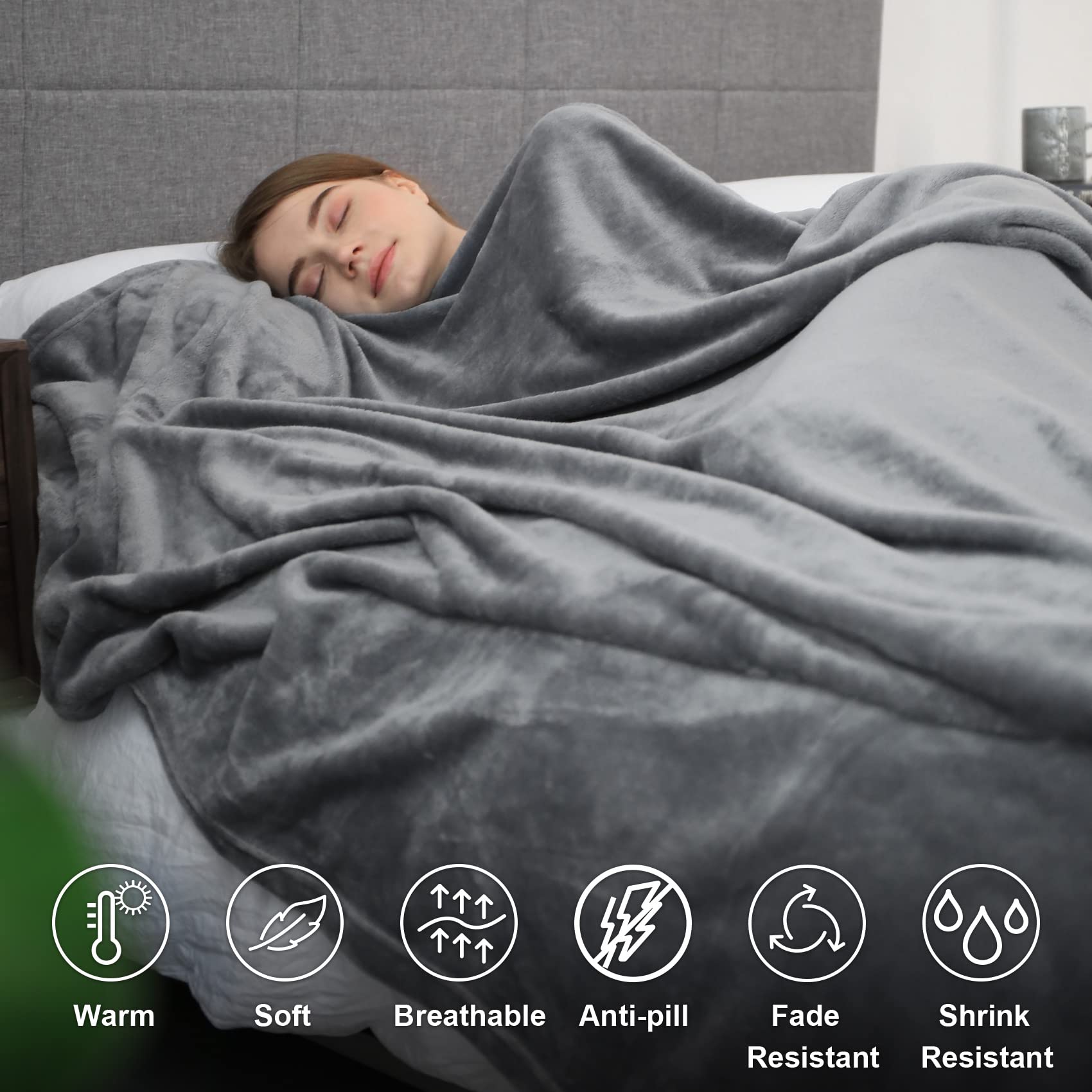 Hansleep blanket draped on bed showcases versatile drape and warmth.