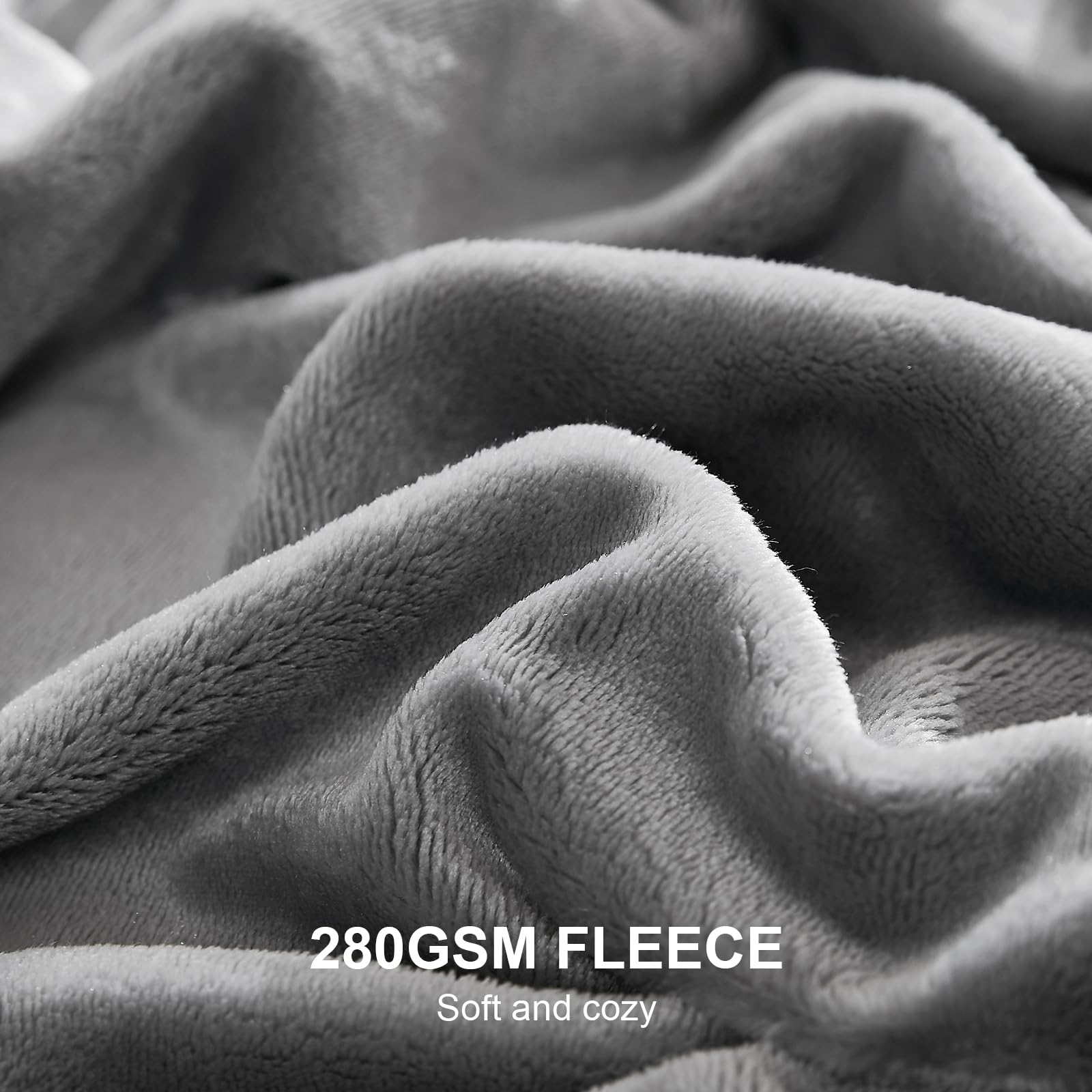 Hansleep blanket draped on sofa enhances decor and comfort.
