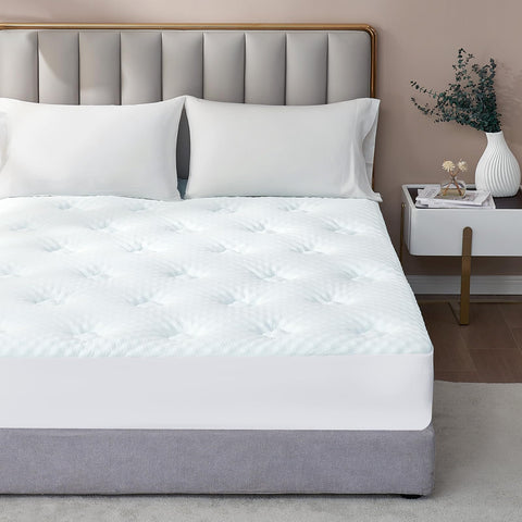 Queen-size Hanssleep topper placed on a bed for added comfort and support.