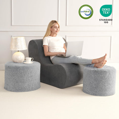 Hansleep pouf in bedroom setting adds cozy seating and decor.