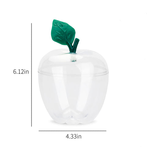 HANZE Christmas decor setup with apple-shaped jar centerpiece