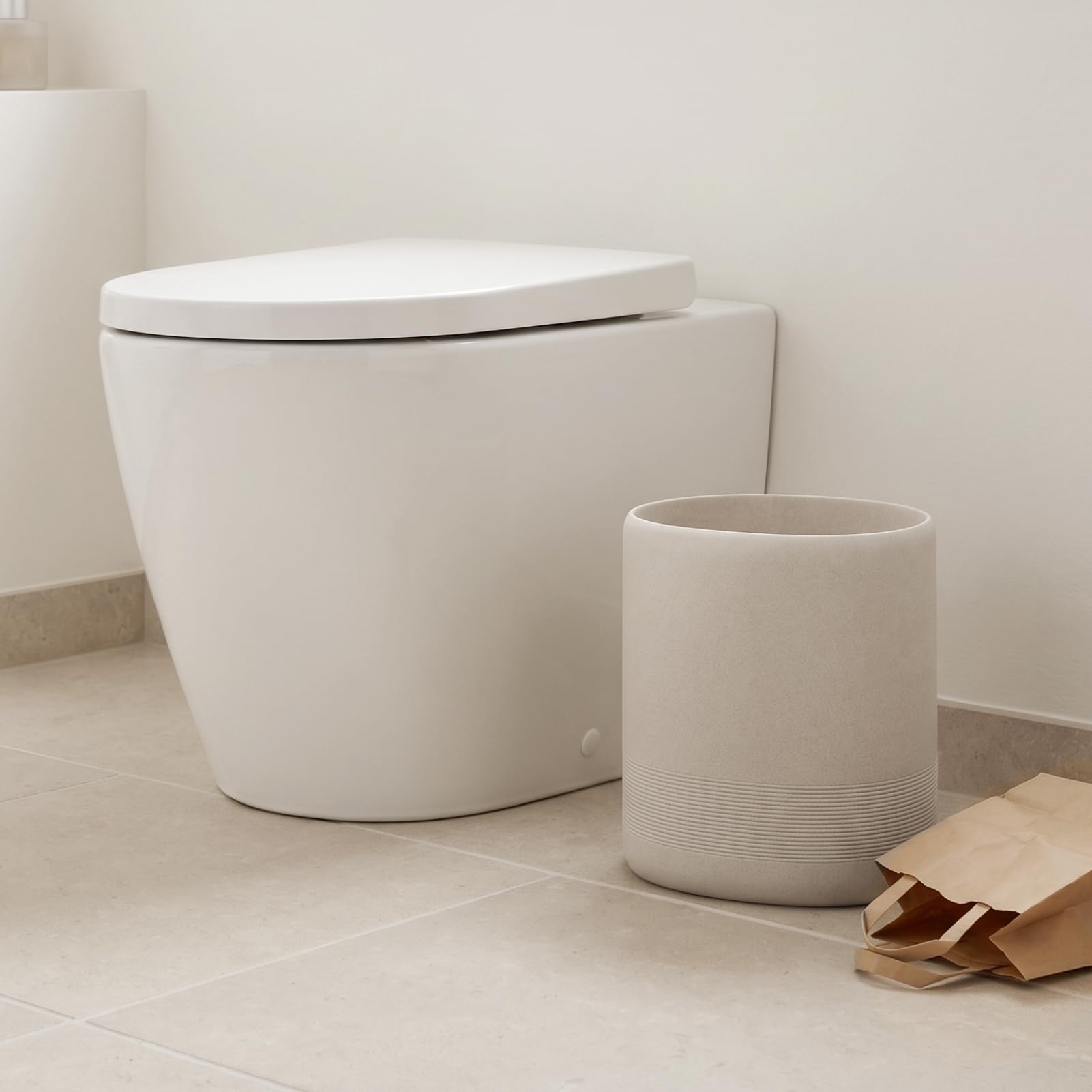 Versatile placement for Haocoott trash bin in living rooms and offices.